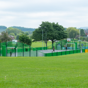 Bespoke MUGA with custom fencing and multi-sport surfacing