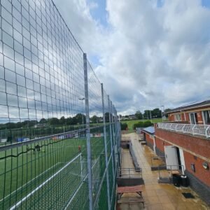 Perimeter Ball Stop Netting installed around an outdoor football pitch