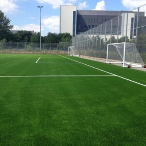 Synthetic turf sports surfacing installed on an outdoor sports facility